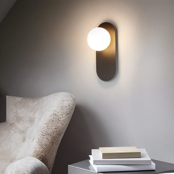 Wandleuchte für das Schlafzimmer aus Metall und Glas